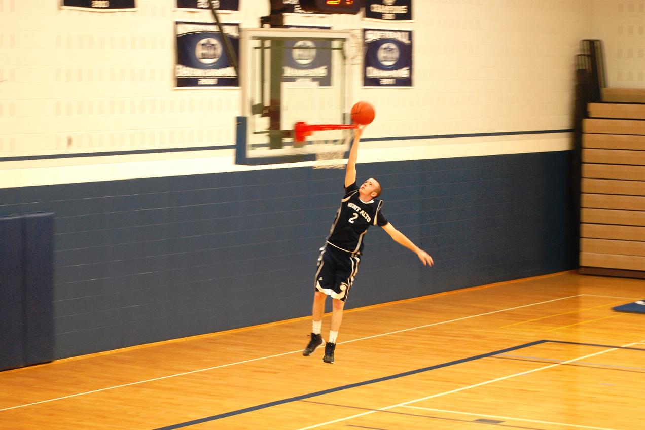 Men's Basketball wins and remains undefeated