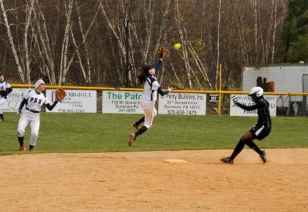 Snowy Weather Doesn&rsquo;t Stop Softball Team from Heating It Up